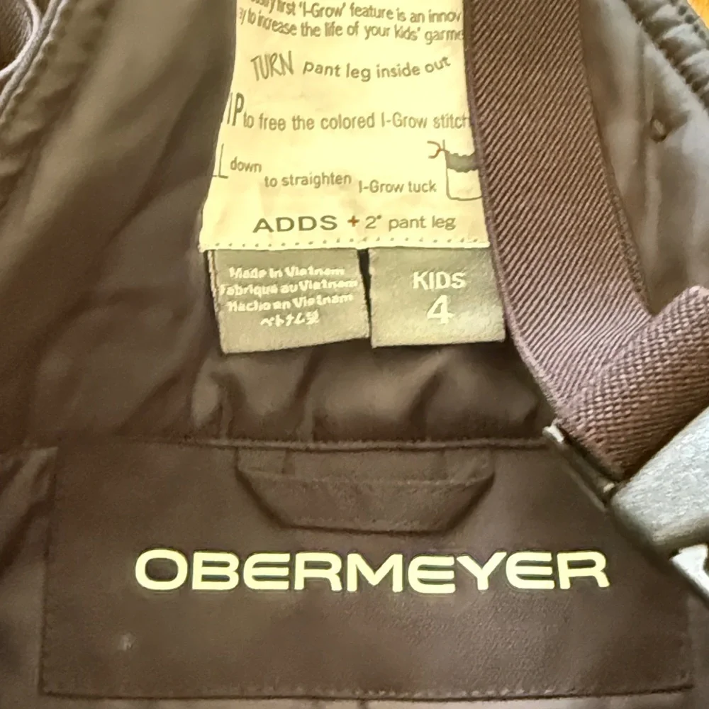 Obermeyer sz 4 Black Kids Snow Pants great pre owned condition